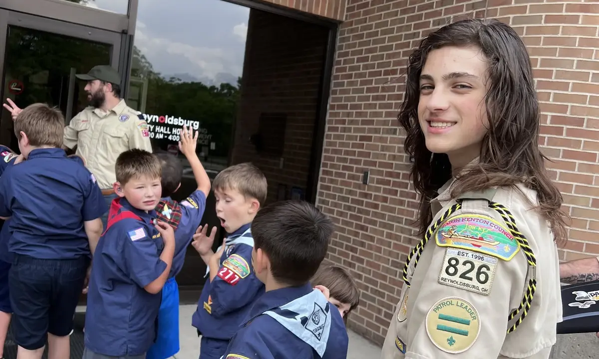 A Troop 826 Den Chief with Pack 277 Cub Scouts outside Reynoldsburg City Hall
