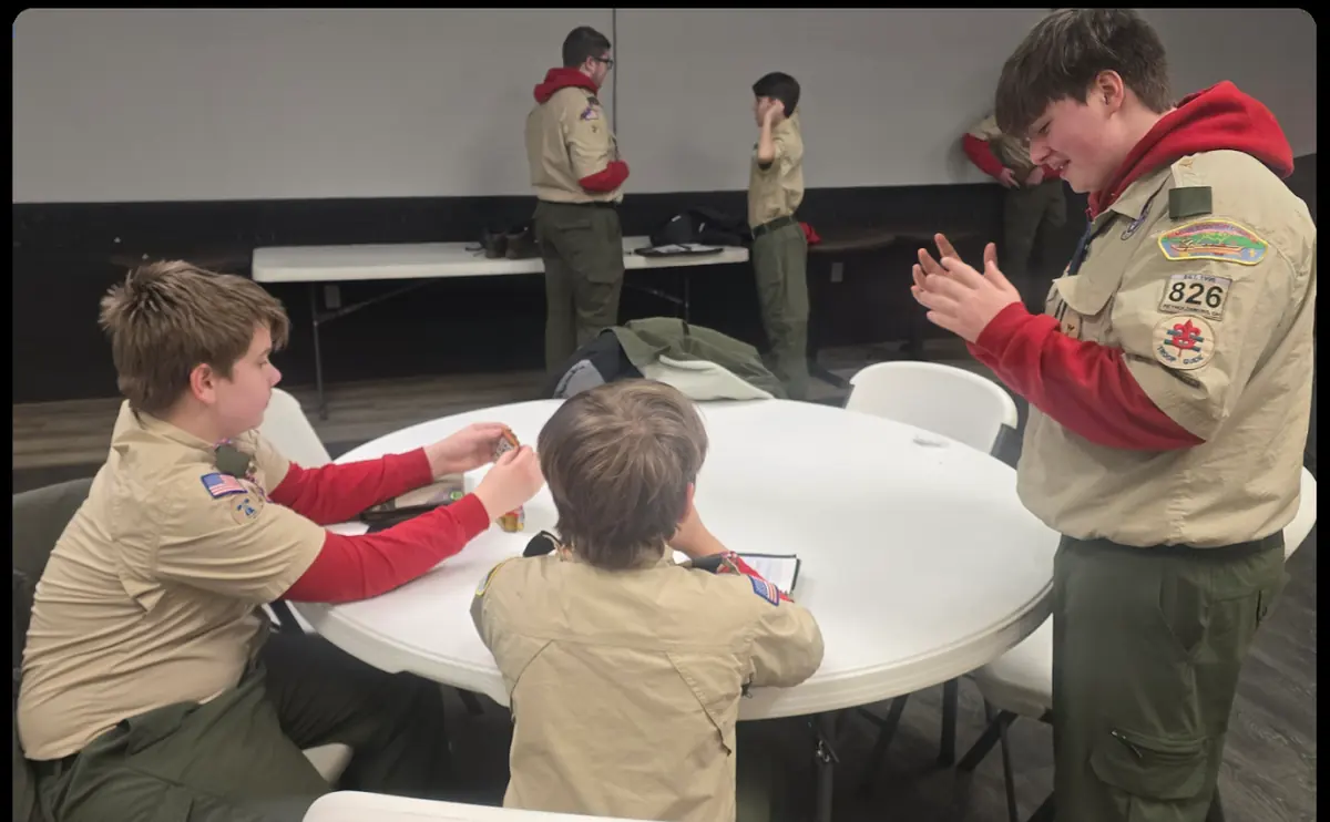 Troop 826 Scouts practicing leadership at a troop meeting